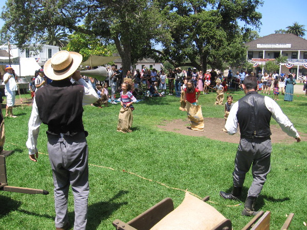 A sack race has everyone laughing.