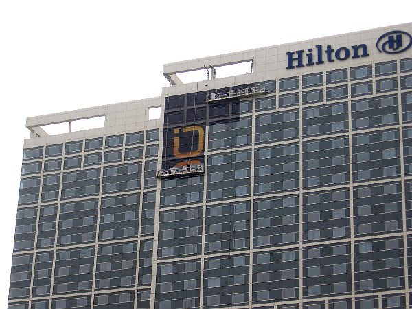 Another building wrap is just starting to appear. This one is on the Hilton San Diego Bayfront. I guess it will promote a show on FX.