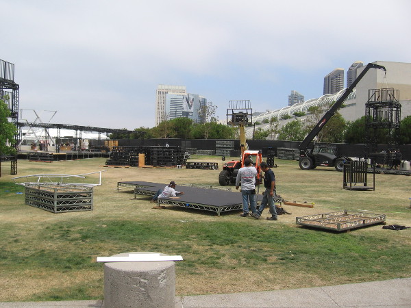 Workers start to set up the FX Fearless Forum in front of the Hilton.