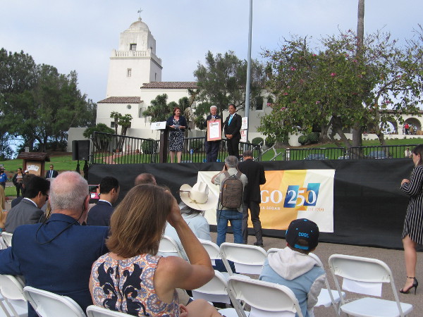 A presentation is made to the San Diego History Center, which operates the Serra Museum and helped to arrange this special ceremony.