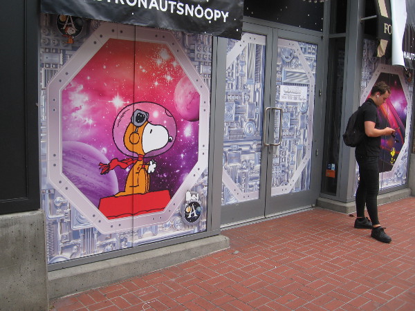 Snoopy rides through space at the Peanuts Pop-Up Shop.