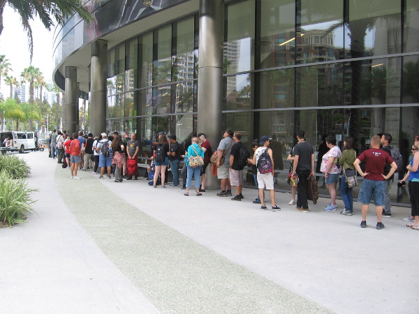 A line has formed for Comic-Con pre-ordered merchandise.