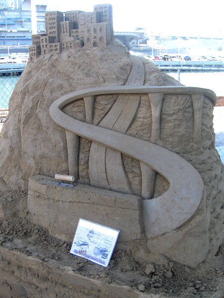 One of the outdoor sand sculptures near the Port Pavilion is sponsored by MTS. It's a work still in progress.