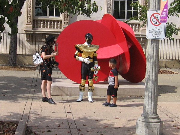 Kid meets Gold Zeo Power Ranger in front of the San Diego Museum of Art!