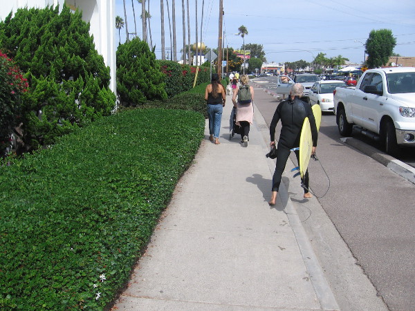 As I walked south, a surfer passed me on the sidewalk going the opposite way.