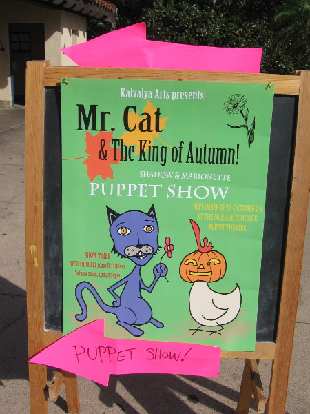 Mr. Cat and The King of Autumn is showing at the Marie Hitchcock Puppet Theatre. That's the goofiest looking chicken I ever saw.