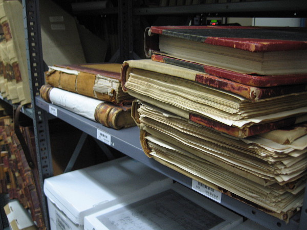 Old books contain important records in the cold vault of the San Diego City Clerk's Archives Center.