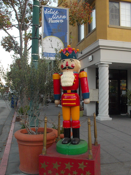 Holiday season decorations now line the streets of Little Italy.