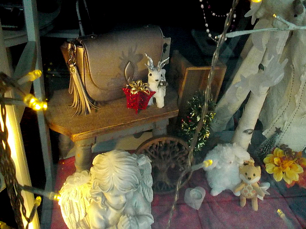 Beautiful holiday gifts are beginning to appear in some downtown shop windows.