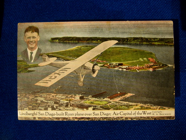 Vintage postcard shows Lindbergh's San Diego-built Ryan plane over San Diego; Air Capital of the West.