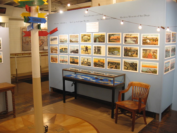 Many historical postcards are on display for the Wishing You Were Here exhibit at the Maritime Museum of San Diego.