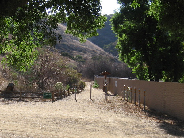 Heading toward the trailhead and some information signs concerning the flume.