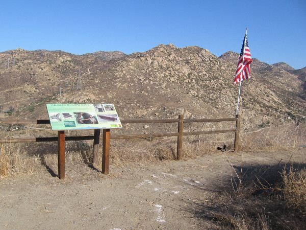 An amazing view of rocky mountains across the valley opens up here.