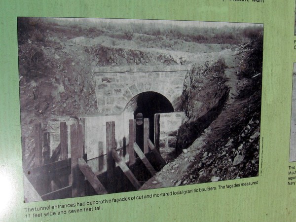 The tunnel entrances had decorate facades of cut and mortared local granitic boulders.