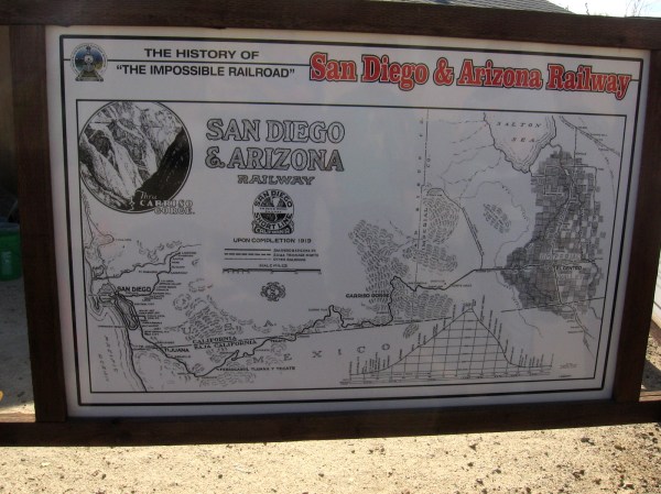 A sign maps the route of the San Diego and Arizona Railway from San Diego through Mexico to El Centro.