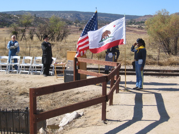 The gold spike ceremony begins.