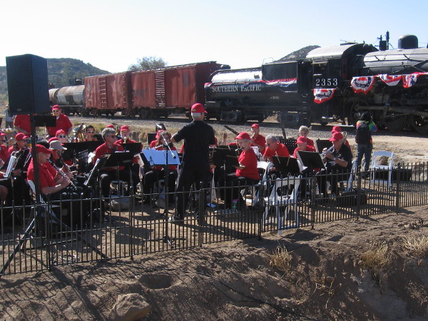 The San Diego City Guard Band plays the San Diego Progress March, written for the railway's completion 100 years ago and performed then by the 1919 version of the City Guard Band.