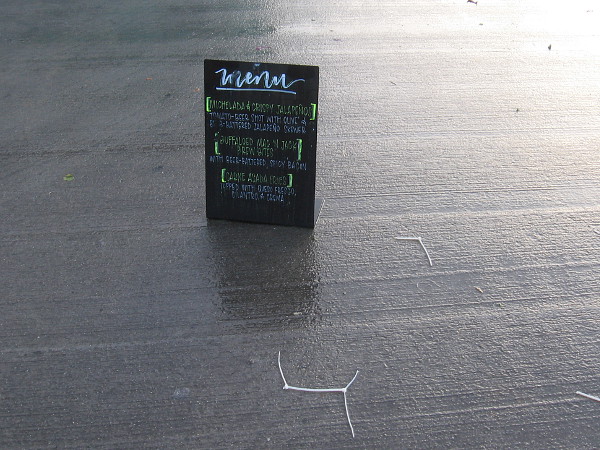 Looks like a food truck might be missing their menu board!