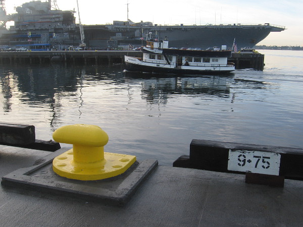 Here comes the Coronado Ferry, passing the USS Midway Museum.
