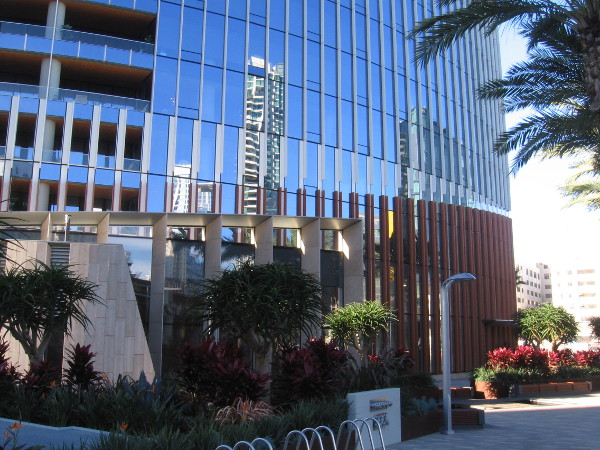 Reflections in the glassy Pacific Gate building.