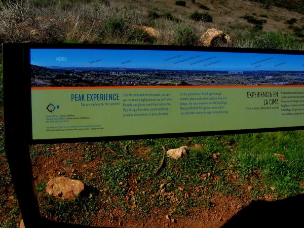 Left part of long sign, showing peaks and features from Mexico northward.