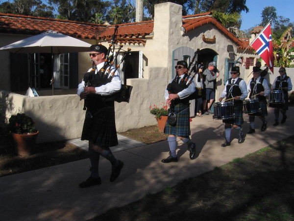 The House of Scotland Pipe Band marches musically to the stage during the HPR Entertainment Sampler.
