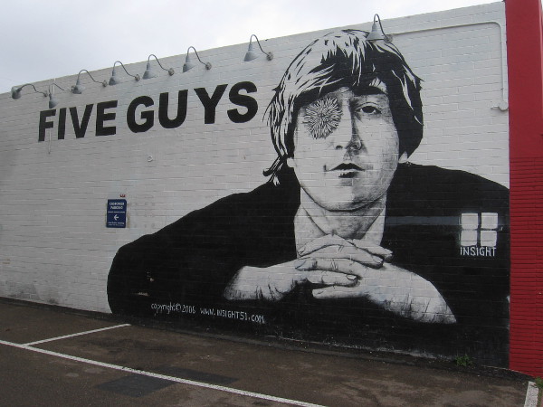 A cool John Lennon mural on the side of Five Guys was painted in 2006 by Steve Gorrow, Creative Director of Insight Clothing.