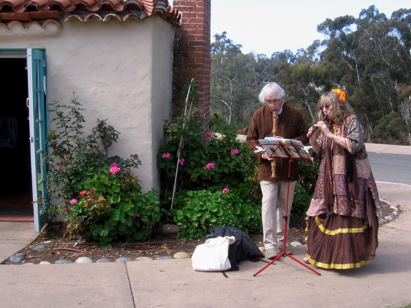 These costumed pipers were providing entertainment as people arrived at the House of Pacific Relations International Cottages.
