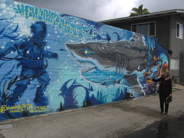 Learning about one of Pacific Beach's many amazing, colorful murals during a guided walk!