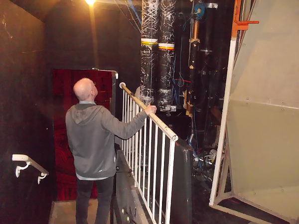 A glimpse of the gritty inner workings of a major theatre, tucked between the audience and the stage.