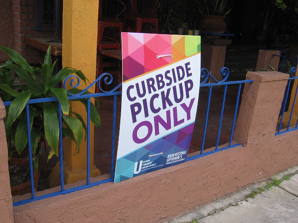 Many restaurants in Hillcrest had Curbside Pickup Only signs out front.
