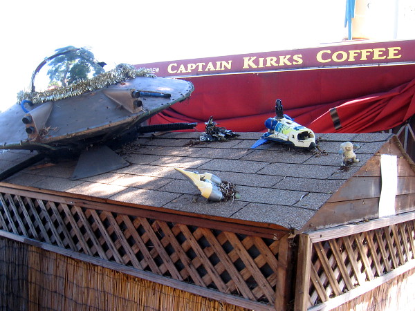 Various spaceships have landed or crashed atop the roof of Captain Kirk's Coffee.