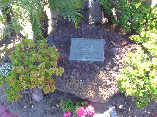 On the island beneath the signs I spotted this plaque.