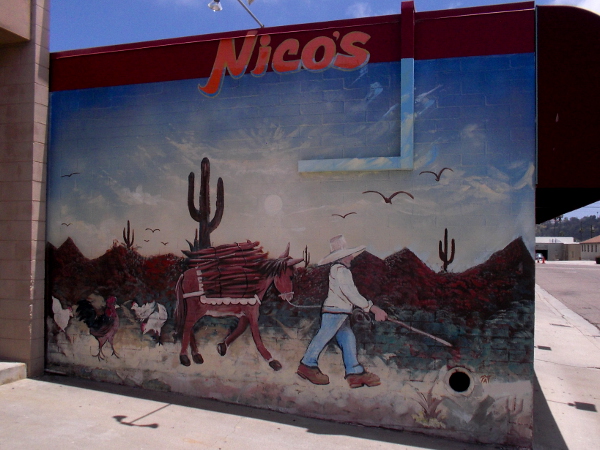 A colorful mural near the front door of Nico's Mexican Food.
