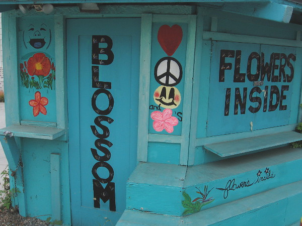The happy exterior of Blossoms Design Florist.