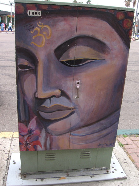 A beautiful, serene face painted on a utility box on Prospect Street in La Jolla.