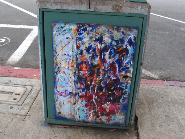 More trashcan street art. This painting is wildly colorful.