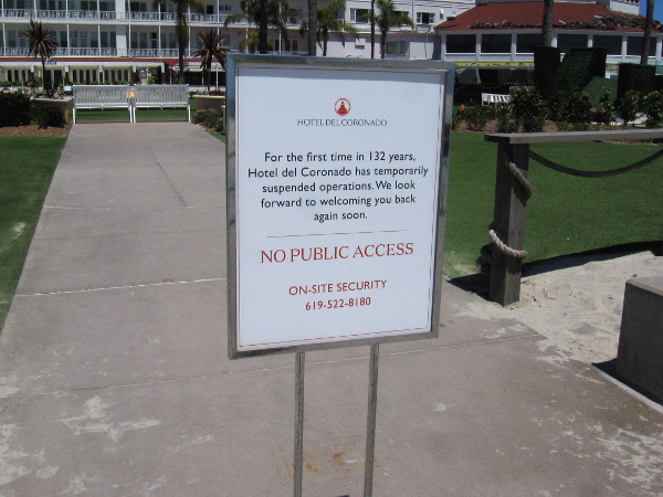 Sign states that for the first time in 132 years, Hotel del Coronado has temporarily suspended operations.