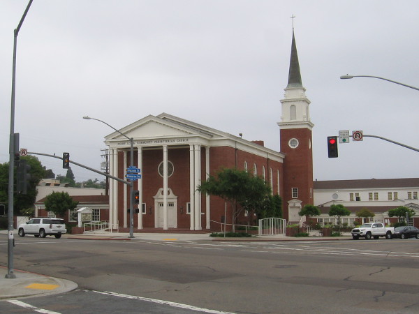 Looking at Point Loma Community Presbyterian Church from the intersection of Voltaire Street and Chatsworth Boulevard. The traditional New England style Red Brick Church was built in 1954.