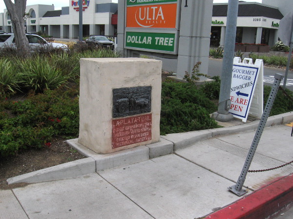 Historical marker recalls early San Diego's La Playa Trail. This plaque can be found on Rosecrans Street near Midway Drive.