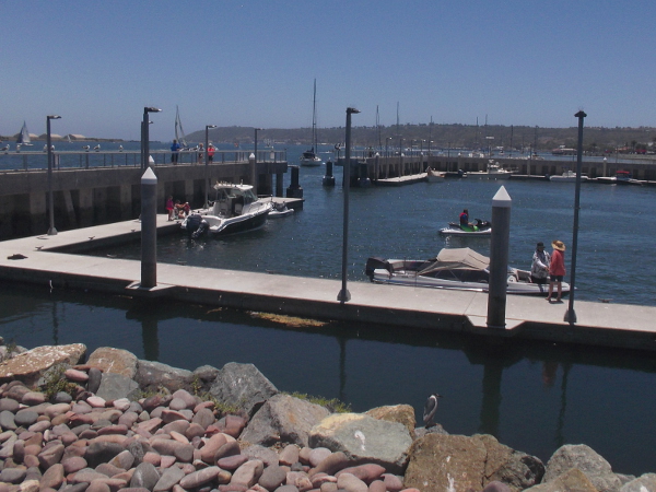 Various types of boats are gathered inside the recently renovated launching basin.