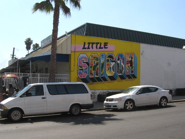 Little Saigon postcard mural on the side of Sin Lee Food Whole Sale on El Cajon Boulevard.