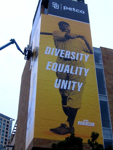 Large wrap on Petco Park celebrates Jackie Robinson. Diversity. Equality. Unity.