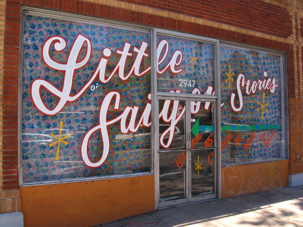 Little Saigon Stories in windows at El Cajon Boulevard and 30th Street.