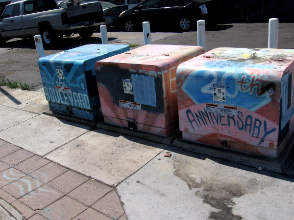 I believe this faded street art in Little Saigon celebrates the 20th Anniversary of The El Cajon Boulevard Business Improvement Association.