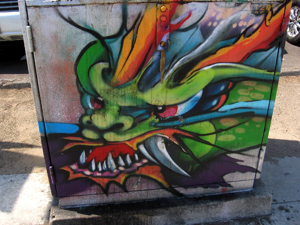 I love this dragon street art. I had to add contrast to many of these photos, because much of the artwork has been faded by time and weather.