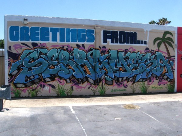 Graffiti-style mural by @NatronWasHere offers Greetings From Serra Mesa.