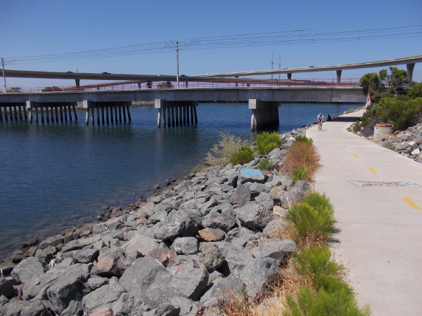 I begin walking west toward various bridges.