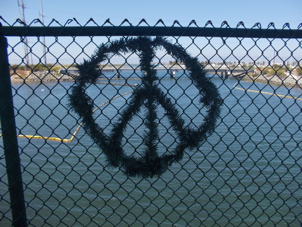 Someone made this cool peace sign out of some artificial wreath material.