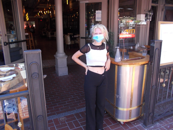 The hostess at The Butcher's Cut Steakhouse greeted me with smiling eyes. I had already gotten some takeout for dinner down the street.